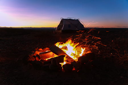 bonfire during sunset thumbnail