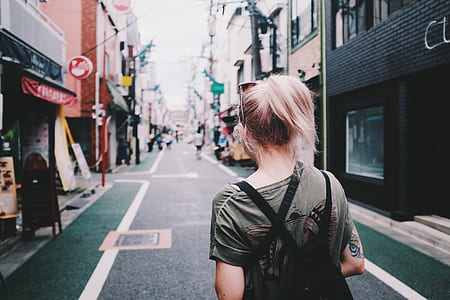 woman standing on road thumbnail