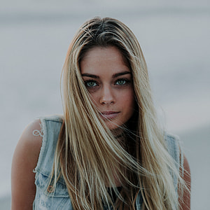 woman in gray sleeveless top thumbnail