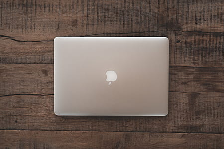 MacBook Pro on brown surface thumbnail