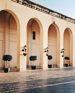beige archway concrete pillars thumbnail