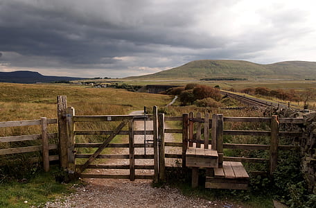closes brown wooden fence at daytime thumbnail