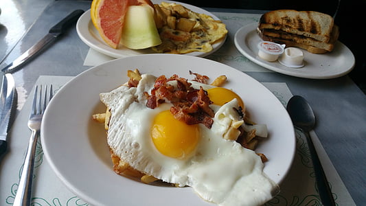 fried egg in round white plate thumbnail