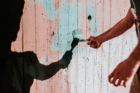 person painting wall thumbnail