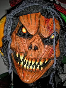 brown and black demon mask thumbnail