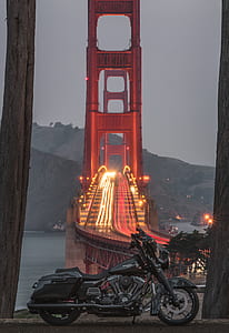 black cruiser motorcycle in front of Golden Gate Bridge thumbnail