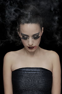 black haired woman wearing strapless top thumbnail