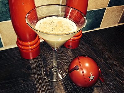 martini glass filled with brown liquid thumbnail