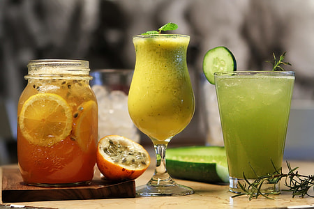 drinking glass filled with green liquid thumbnail