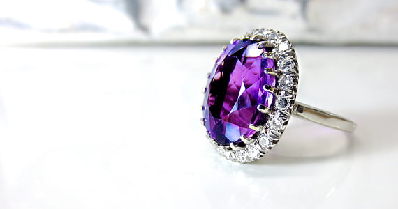 close up photo of purple gemstone solitaire ring thumbnail