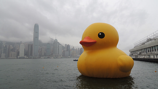 photo of giant yellow rubber duck beside cruise ship thumbnail