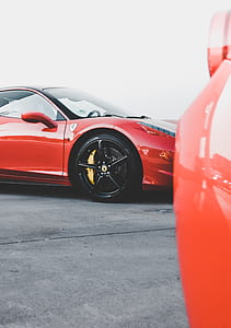 closeup photo of red coupe thumbnail