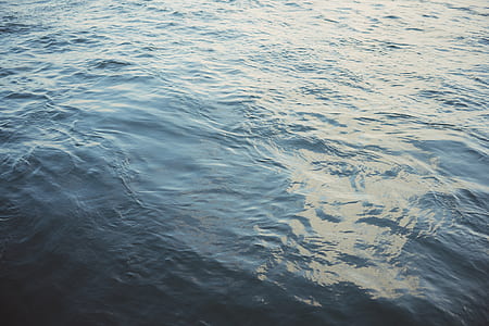 calm body of water at daytime thumbnail