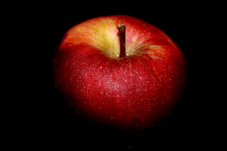Close-up of Apple Against Black Background thumbnail