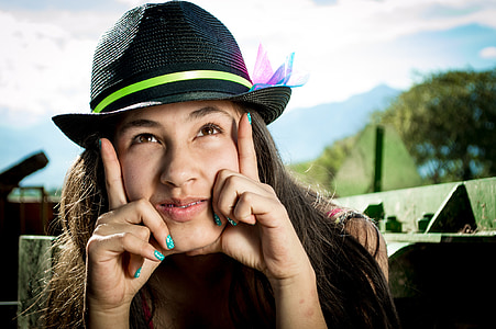 woman wearing black cup looking up thumbnail