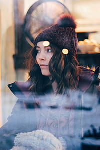 woman wearing red and black parka coat thumbnail