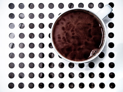 white ceramic mug with brown liquid thumbnail