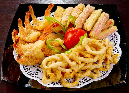tempura, green vegetable, and calamari on brown table thumbnail