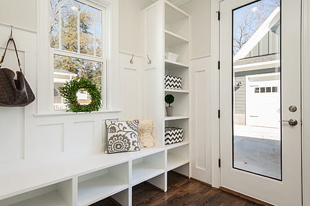 clear glass door near rack and chair thumbnail