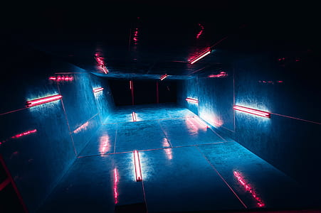 narrow building interior with red light in low angle photography thumbnail