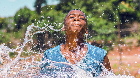 person swimming during daytime thumbnail