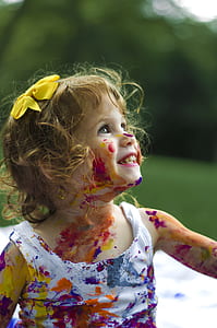 photo of girl with paint steins all over her body thumbnail