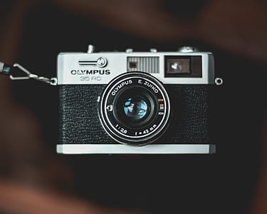 gray and black Olympus 35 RC camera thumbnail