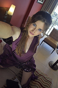 photo of woman wearing purple top thumbnail