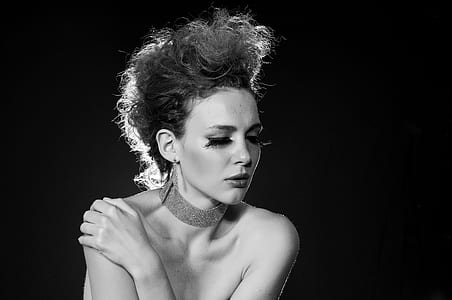 grayscale photography of woman with choker necklace thumbnail