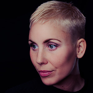 close-up photography of woman wearing tops thumbnail