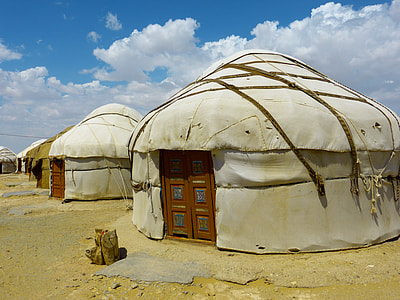 two beige tents on desert thumbnail