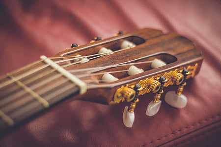 closeup photo of classical guitar headstock thumbnail