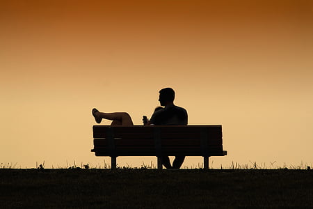 man sitting on bench thumbnail