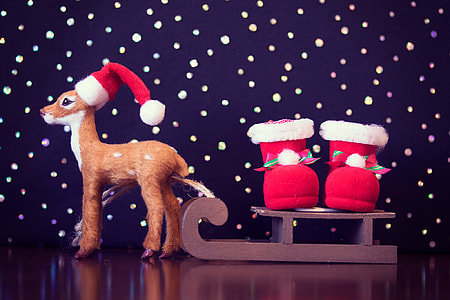 reindeer figurine with sleigh and santa boots thumbnail