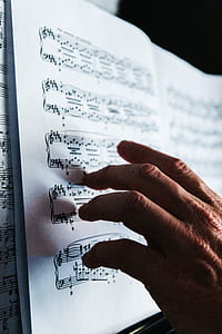 person holding music note thumbnail