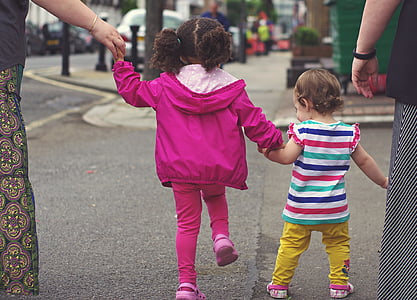 girl wearing pink leather hooded jacket thumbnail