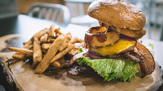 grilled patty, bacon, and cheese in burger bun thumbnail