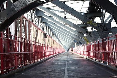 A sidewalk on the caged-design iron walking bridge thumbnail