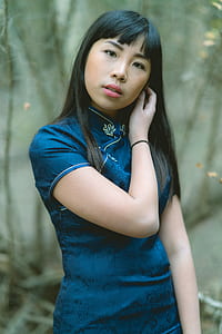 woman wearing blue traditional dress thumbnail