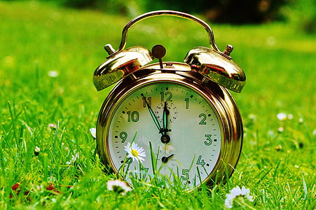 round gold-colored analog table clock thumbnail