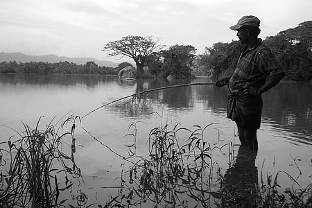 man holding fishing rod thumbnail
