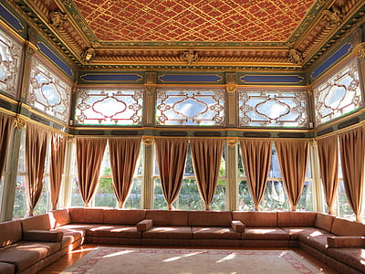 landscape photography of brown suede sectional couch inside room thumbnail