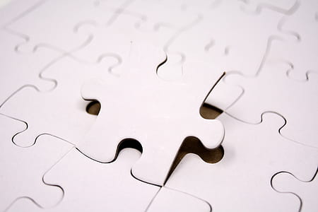 close-up photo of white puzzles thumbnail
