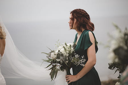 woman carrying bouquet of flower thumbnail