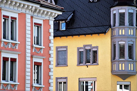 yellow and orange concrete buildings thumbnail