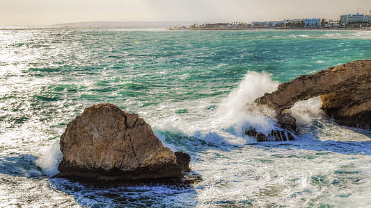 waves crashing rocks thumbnail