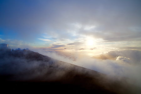 brown mountain with clouds at daytime thumbnail