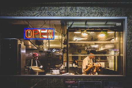 woman standing inside diner thumbnail