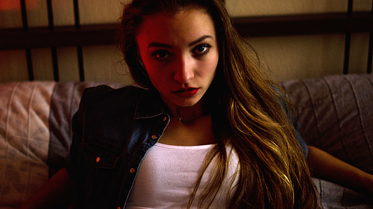 Hot Girl sitting on the couch in blue denim thumbnail