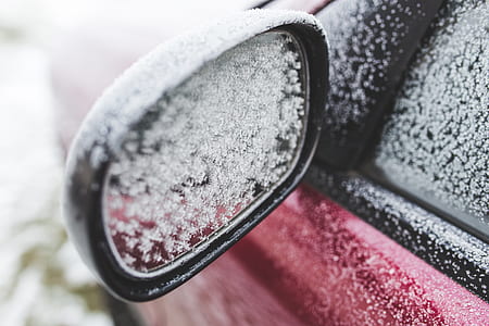 black side mirror with snow thumbnail